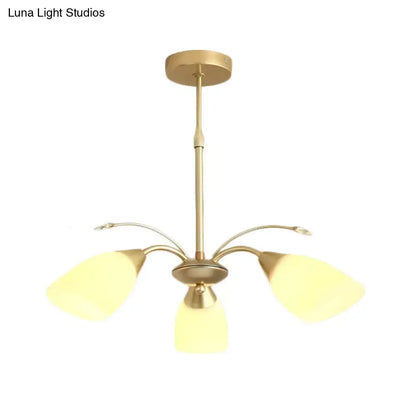 Decorbites gold glass chandelier brass finish with three curved arms and yellow glass shades on Tampa Home & Garden Store