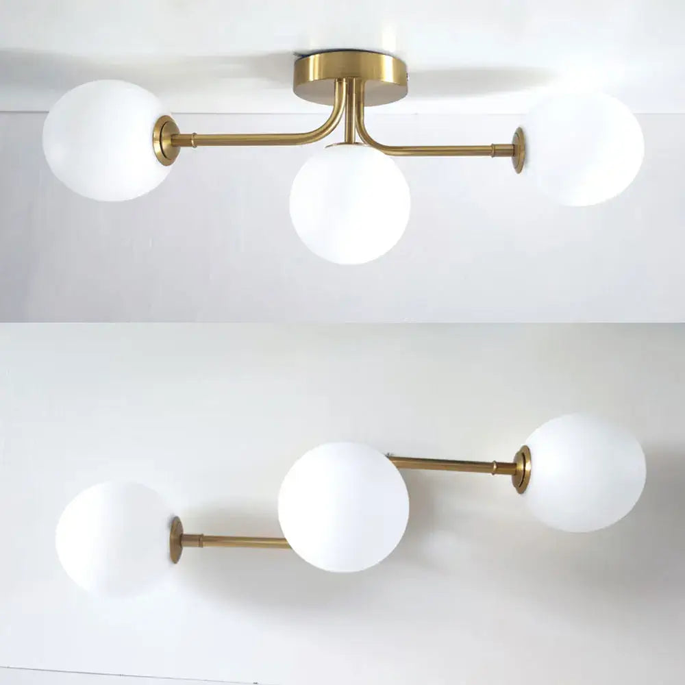 Brass Ball Ceiling Light with three frosted glass globes on brass arms Decorbites on Tampa Home & Garden Store