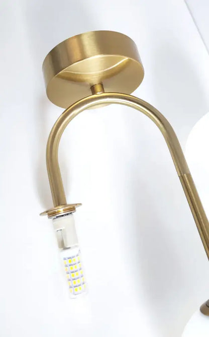 Brass Ball Ceiling Light flush mount with curved brass arm and LED bulb visible Decorbites on Tampa Home & Garden Store