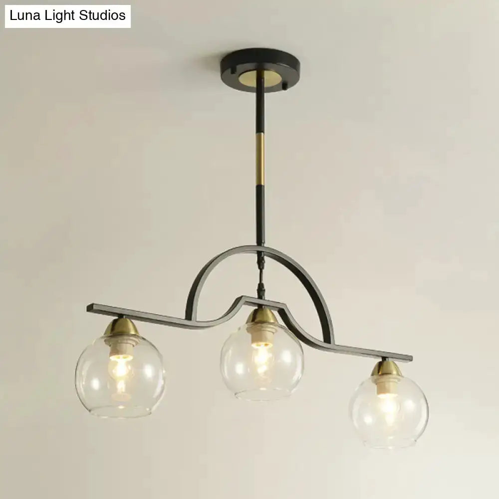 Modern black & brass arched pendant light with three glass globes kitchen by Decorbites on Tampa Home & Garden Store