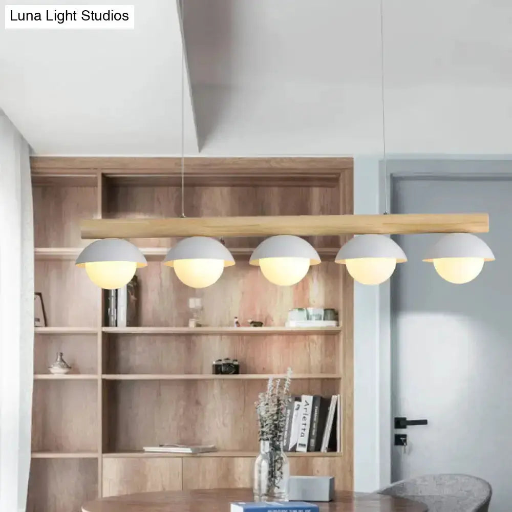 Decorbites five-light modern wood LED island pendant with natural wood bar and white shades on Tampa Home & Garden Store