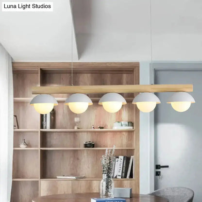 Decorbites five-light modern wood LED island pendant with natural wood bar and white shades on Tampa Home & Garden Store