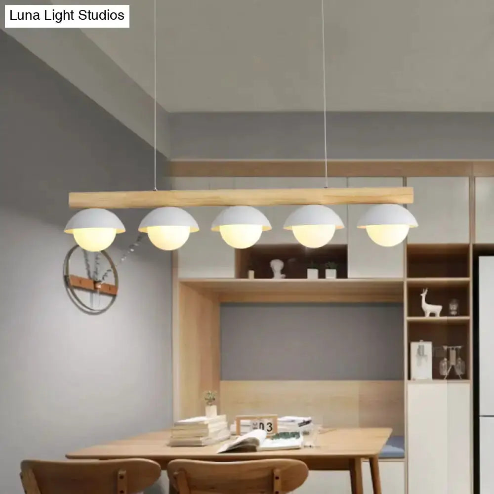 Decorbites modern wood LED five-light pendant for dining room with white glass shades on Tampa Home & Garden Store