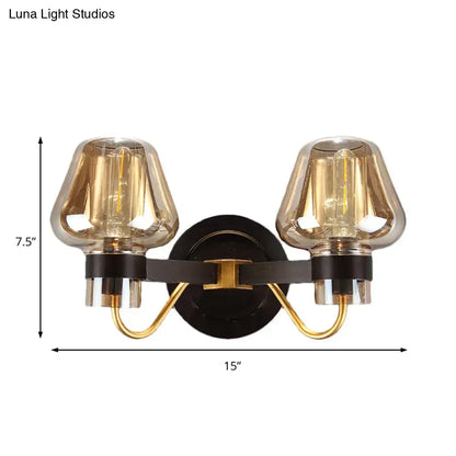 Amber glass mushroom sconce by Decorbites, dual bulbs, black mount with brass arms on Tampa Home & Garden Store