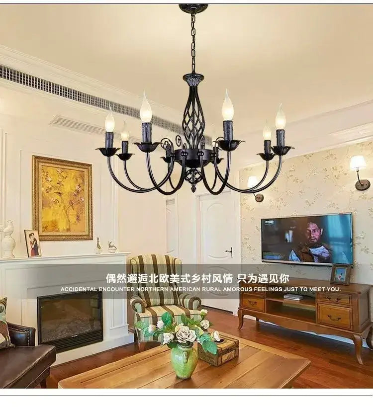 Black Iron Scroll Chandelier by Decorbites with candle-style bulbs and curved arms on Tampa Home & Garden Store