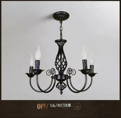 Decorbites Black Iron Scroll Chandelier with five candle bulbs, curved arms, ceiling chain on Tampa Home & Garden Store