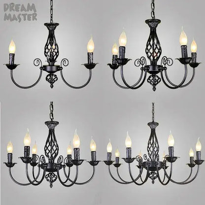 Set of four black iron scroll chandeliers by Decorbites with candle-style bulbs on Tampa Home & Garden Store