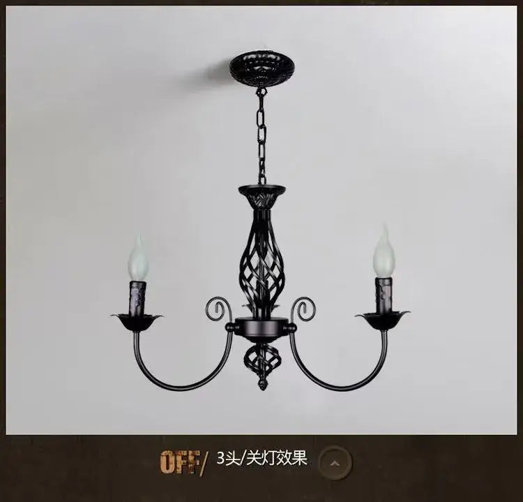 Black Iron Scroll Chandelier Decorbites with curved arms and candle-style sockets on Tampa Home & Garden Store
