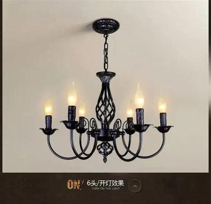 Black iron scroll chandelier with six candle-style lights, chain-hung, Decorbites on Tampa Home & Garden Store