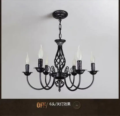 Black Iron Scroll Chandelier by Decorbites with six candle bulbs in wrought iron on Tampa Home & Garden Store
