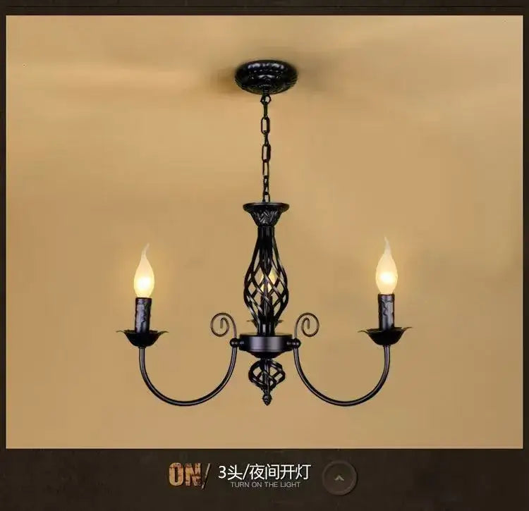 Black Iron Scroll Chandelier Decorbites three-light candlestick with curved arms and chain on Tampa Home & Garden Store