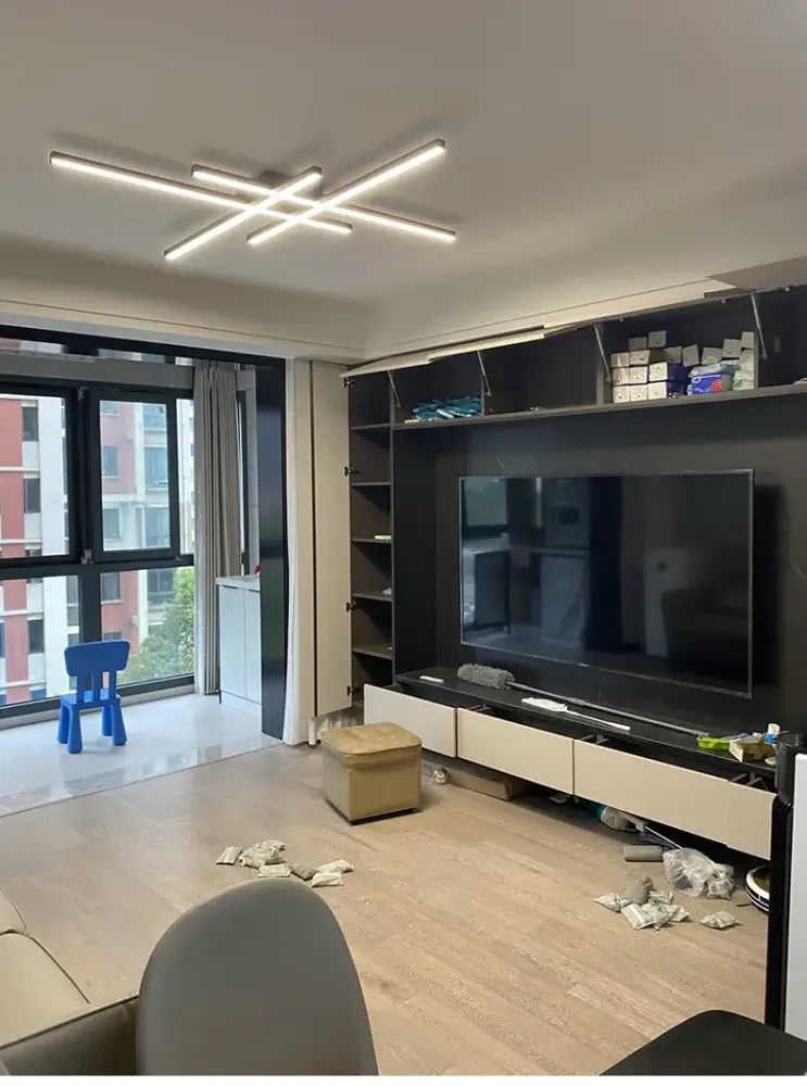 Black Square LED Chandelier ceiling-mounted linear bar arrangement in modern living room on Tampa Home & Garden Store