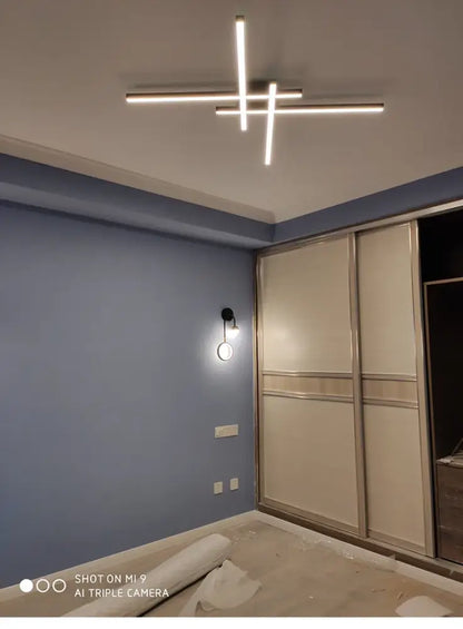 Decorbites Black Square LED Chandelier with intersecting black metal LED bars on Tampa Home & Garden Store