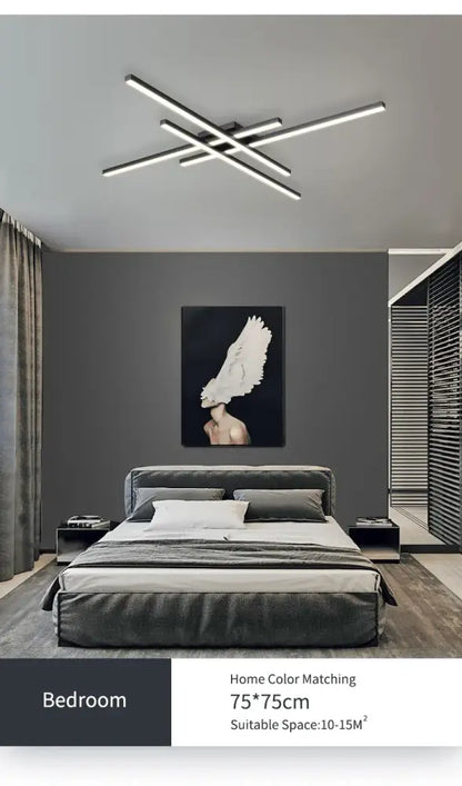 Black square LED chandelier by Decorbites in a modern grey bedroom over a king bed on Tampa Home & Garden Store