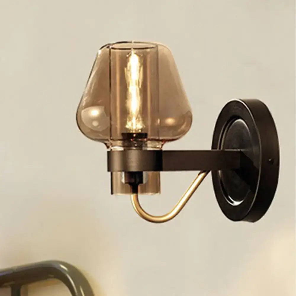 Black Amber Glass Sconce by Decorbites with black round backplate and brass curved arm on Tampa Home & Garden Store