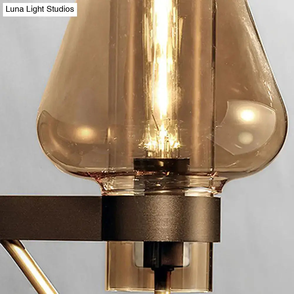Black amber glass sconce by Decorbites with black metal mount on Tampa Home & Garden Store
