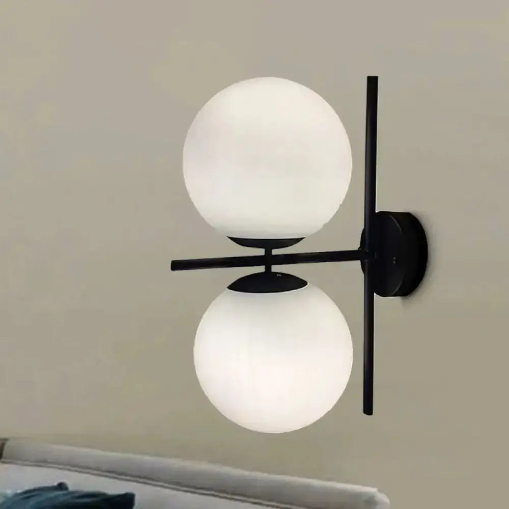 Wall light fixture modern black and white spherical globe pair on black metal mount Decorbites on Tampa Home & Garden Store