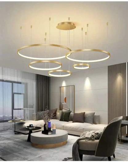 Modern black and gold ring pendant chandelier with five illuminated rings for living rooms on Tampa Home & Garden Store