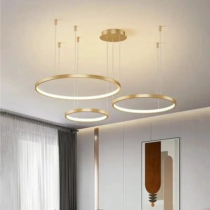 Chandelier Decorbites modern black and gold ring pendant, dimmable with three illuminated rings on Tampa Home & Garden Store