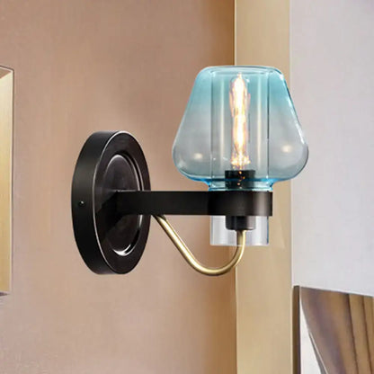 Blue Glass Tapered Wall Sconce by Decorbites with black backplate and brass curved arm on Tampa Home & Garden Store