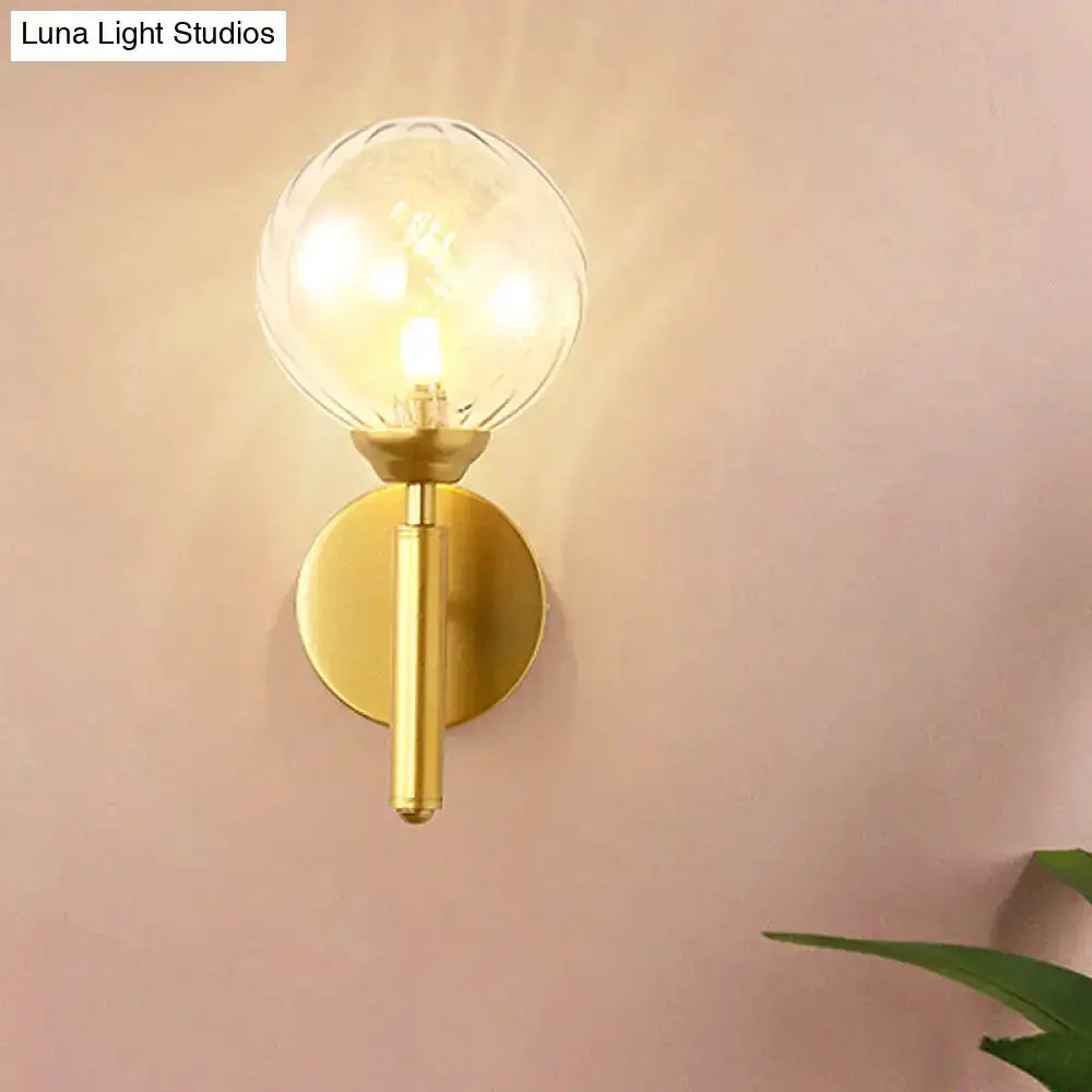 Modern brass glass sphere wall lamp with clear globe by Decorbites on Tampa Home & Garden Store