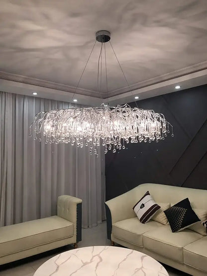 Modern golden aluminum crystal chandelier by Decorbites with cascading crystals on Tampa Home & Garden Store