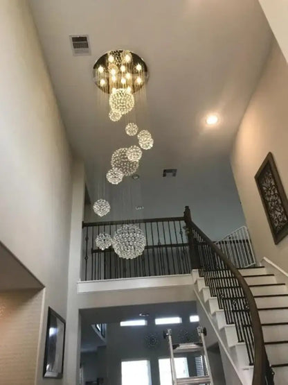 Crystal Raindrop Chandelier by Decorbites; cascading glass spheres from a gold canopy on Tampa Home & Garden Store