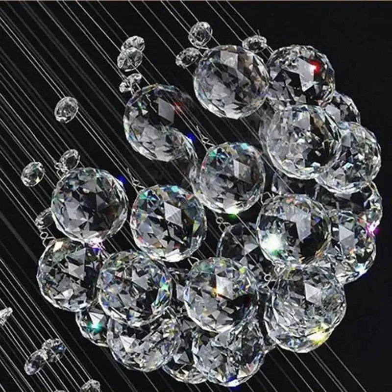 Crystal Raindrop Chandelier by Decorbites; clear faceted crystal spheres suspended on wires on Tampa Home & Garden Store
