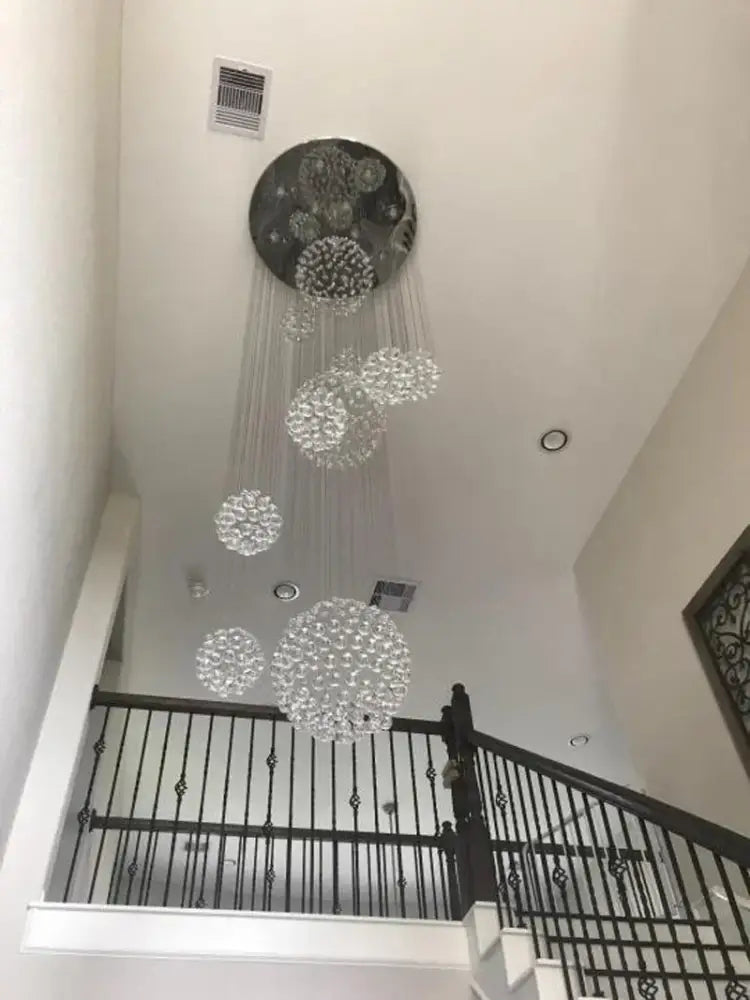 Crystal Raindrop Chandelier by Decorbites with clear crystal spheres hanging from ceiling mount on Tampa Home & Garden Store