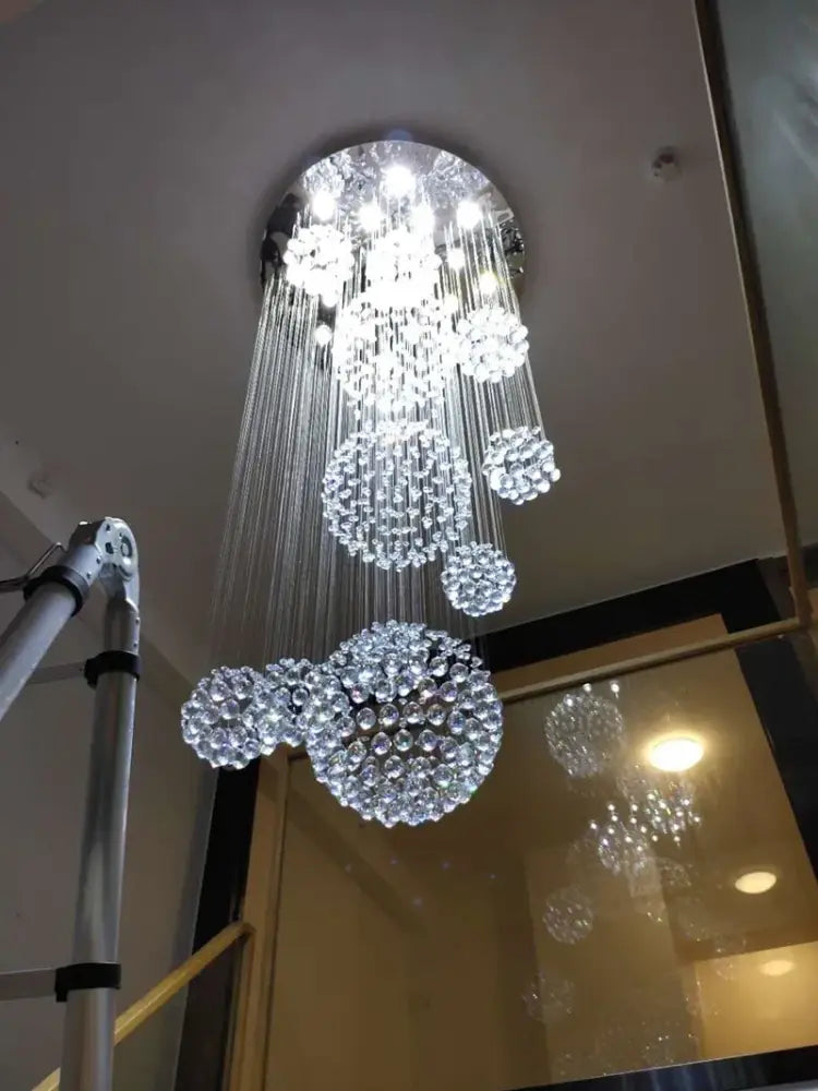 Crystal Raindrop Chandelier with hanging crystal strands and spherical crystal clusters on Tampa Home & Garden Store