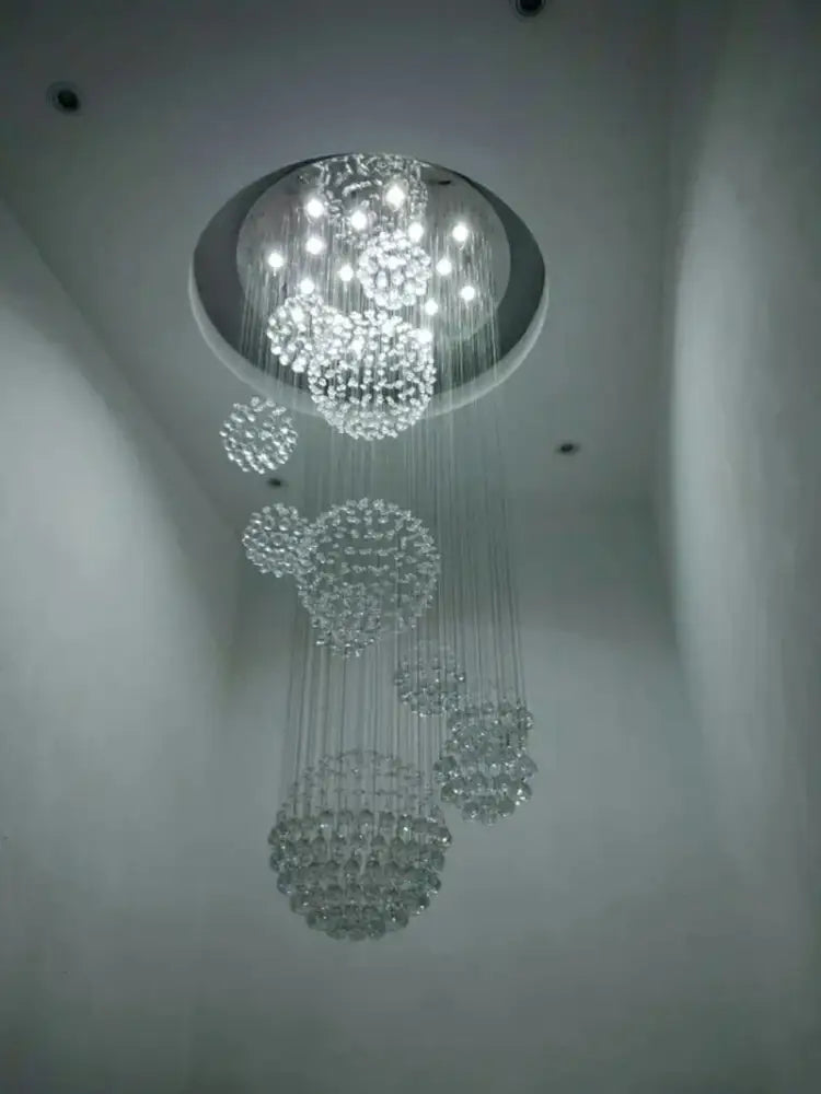 Crystal Raindrop Chandelier by Decorbites with cascading crystal clusters and chrome canopy on Tampa Home & Garden Store