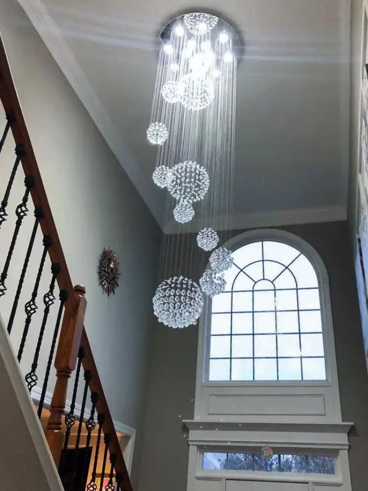 Crystal Raindrop Chandelier Decorbites, clear crystal spheres on cascading strands in a foyer on Tampa Home & Garden Store