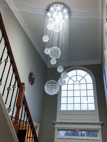 Crystal Raindrop Chandelier Decorbites, clear crystal spheres on cascading strands in a foyer on Tampa Home & Garden Store