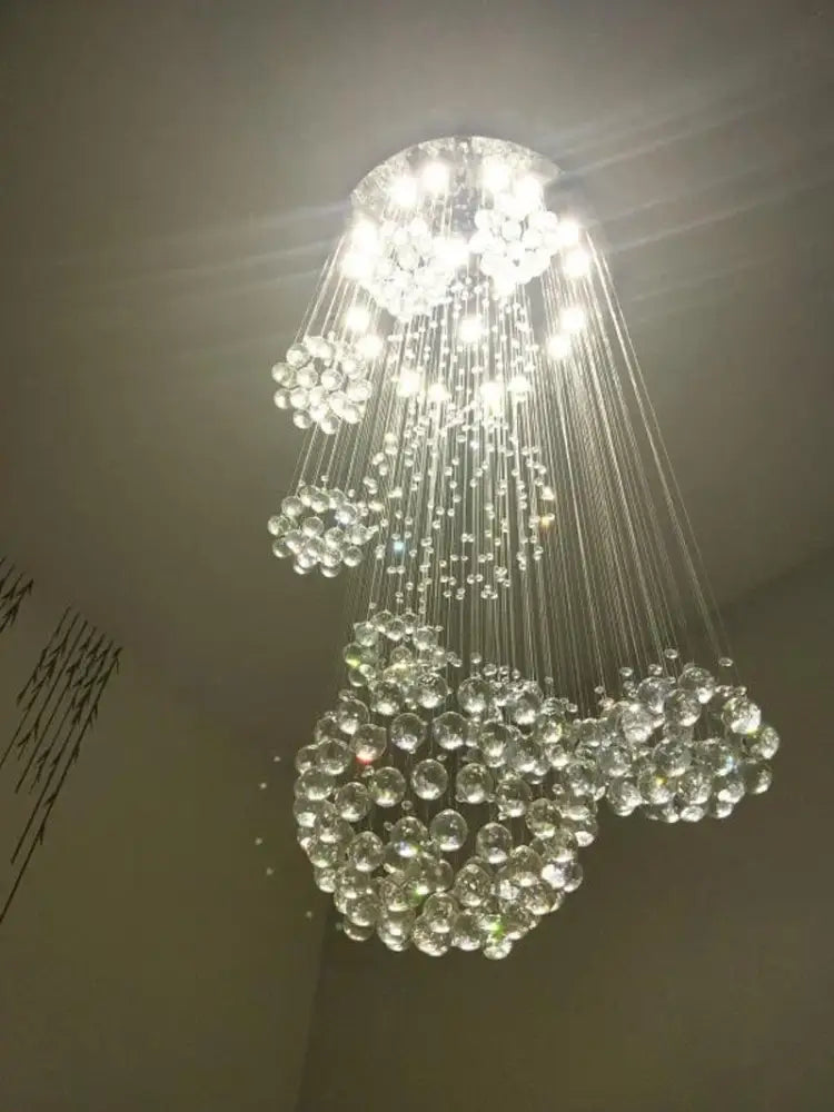 Crystal Raindrop Chandelier by Decorbites; crystal spheres cascade on hanging strands on Tampa Home & Garden Store