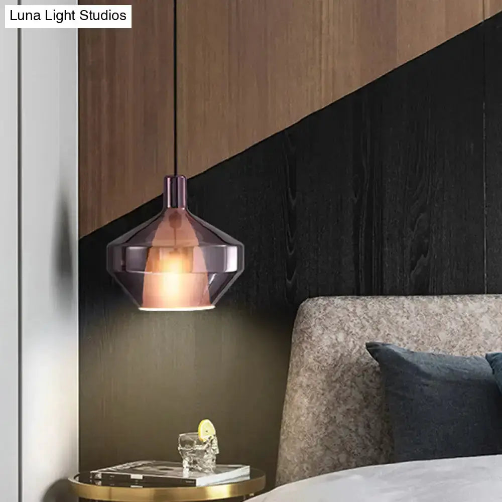 Modern amber and copper geometric pendant light with faceted glass shade on Tampa Home & Garden Store