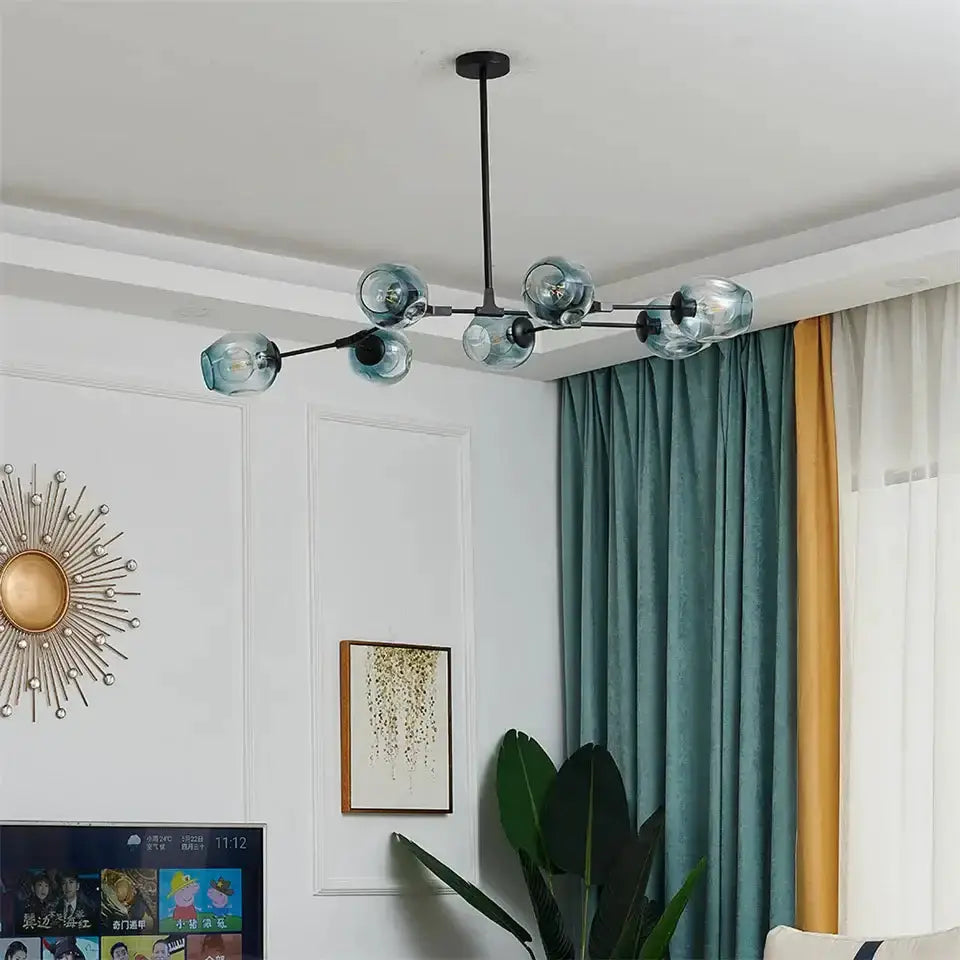 Chandelier modern black metal frame with six amber glass ball pendants on Tampa Home & Garden Store