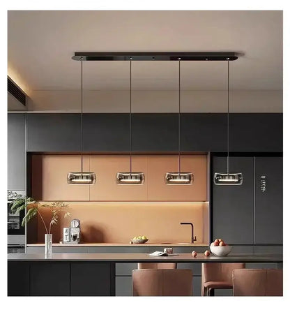 Decorbites modern black glass dining pendant lights set of 4 over a dark kitchen island on Tampa Home & Garden Store
