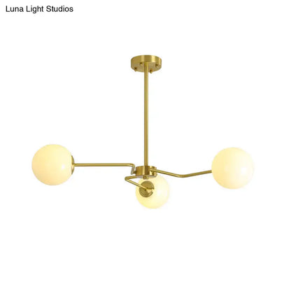 Gold Glass Ceiling Light with three frosted globes and brass arms by Decorbites on Tampa Home & Garden Store