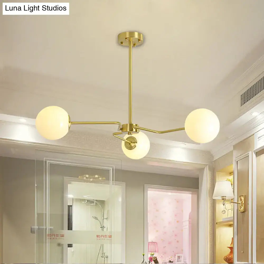 Gold Glass Ceiling Light flush mount with brass arms and three frosted glass globes on Tampa Home & Garden Store