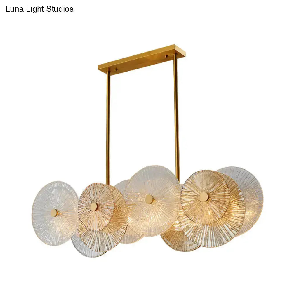 Modern gold finish pendant light with prismatic glass discs from Decorbites on Tampa Home & Garden Store
