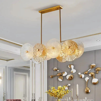 Modern gold pendant light with five prismatic glass disc shades for dining room on Tampa Home & Garden Store