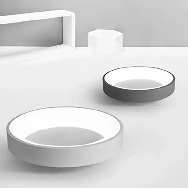 White Nordic ceiling light flush mount by Decorbites; two white diffusers with gray rims on Tampa Home & Garden Store