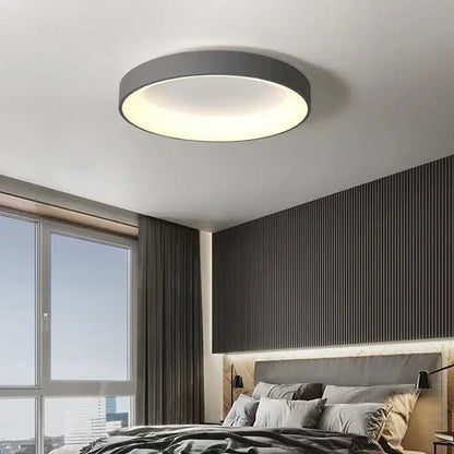 White Nordic ceiling light flush mount with dark gray rim and diffused glow on Tampa Home & Garden Store