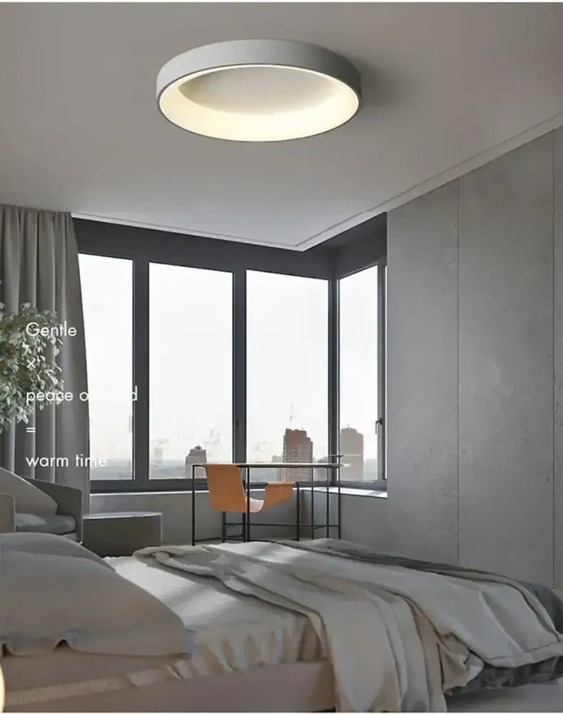 White Nordic Ceiling Light flush mount by Decorbites in a modern bedroom on Tampa Home & Garden Store