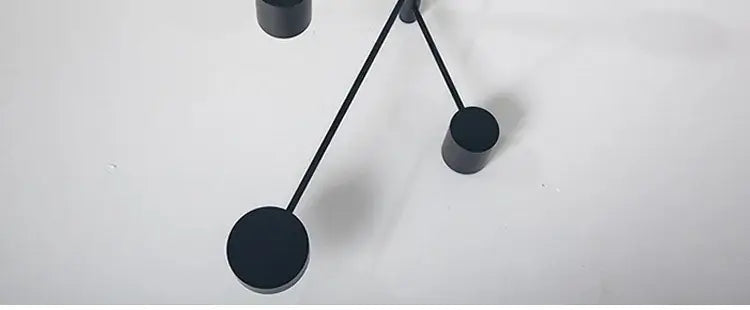Gold Black Minimalist Chandelier by Decorbites with black metal discs and slim rods on Tampa Home & Garden Store