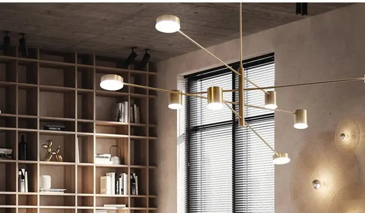 Gold Black Minimalist Chandelier by Decorbites; gold metal arms with cylindrical lights on Tampa Home & Garden Store