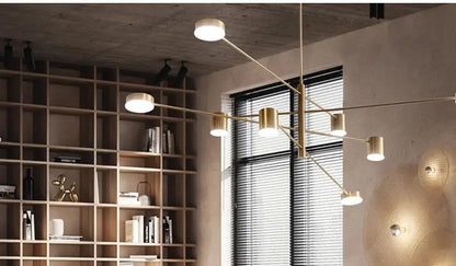 Gold Black Minimalist Chandelier by Decorbites; gold metal arms with cylindrical lights on Tampa Home & Garden Store