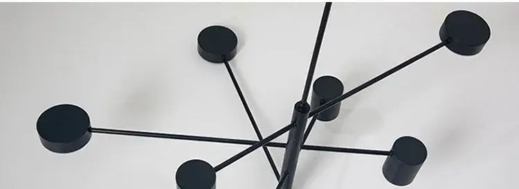 Gold Black Minimalist Chandelier by Decorbites with black metal starburst arms on Tampa Home & Garden Store