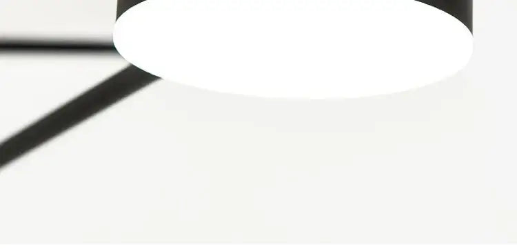 Gold Black Minimalist Chandelier close-up with black metal frame and white circular shade on Tampa Home & Garden Store