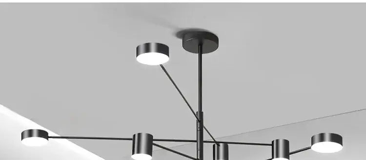 Gold Black Minimalist Chandelier by Decorbites with black metal arms and white shades on Tampa Home & Garden Store